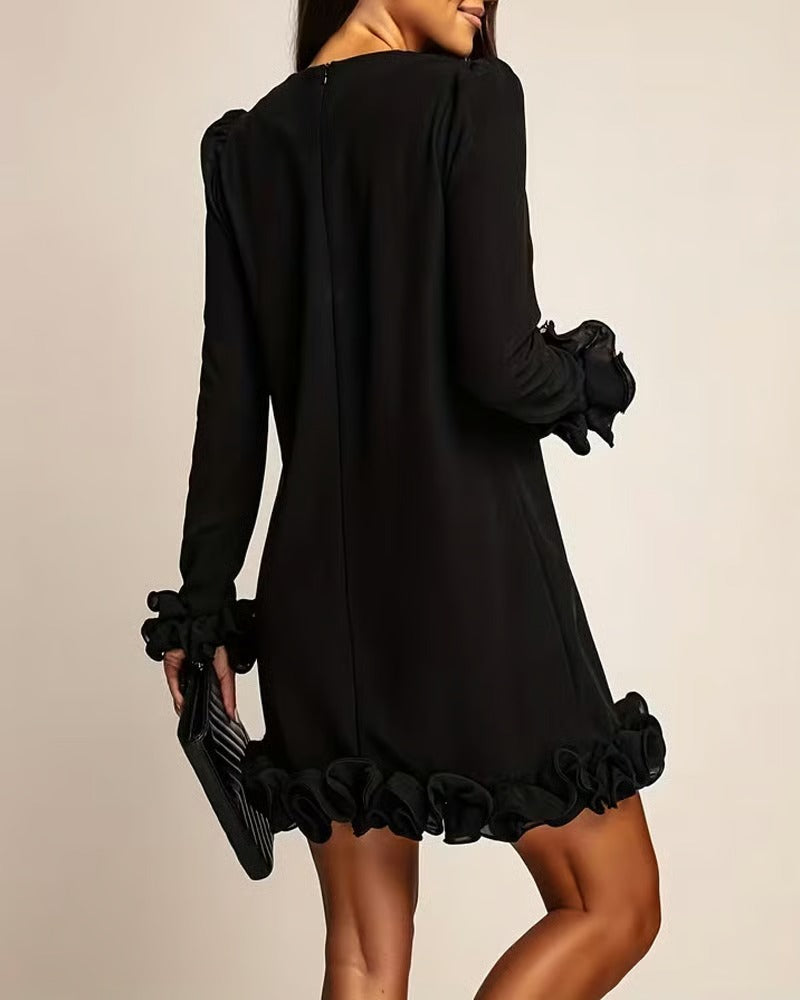 Vestido con mangas abullonadas y corte recto con capullos de flores